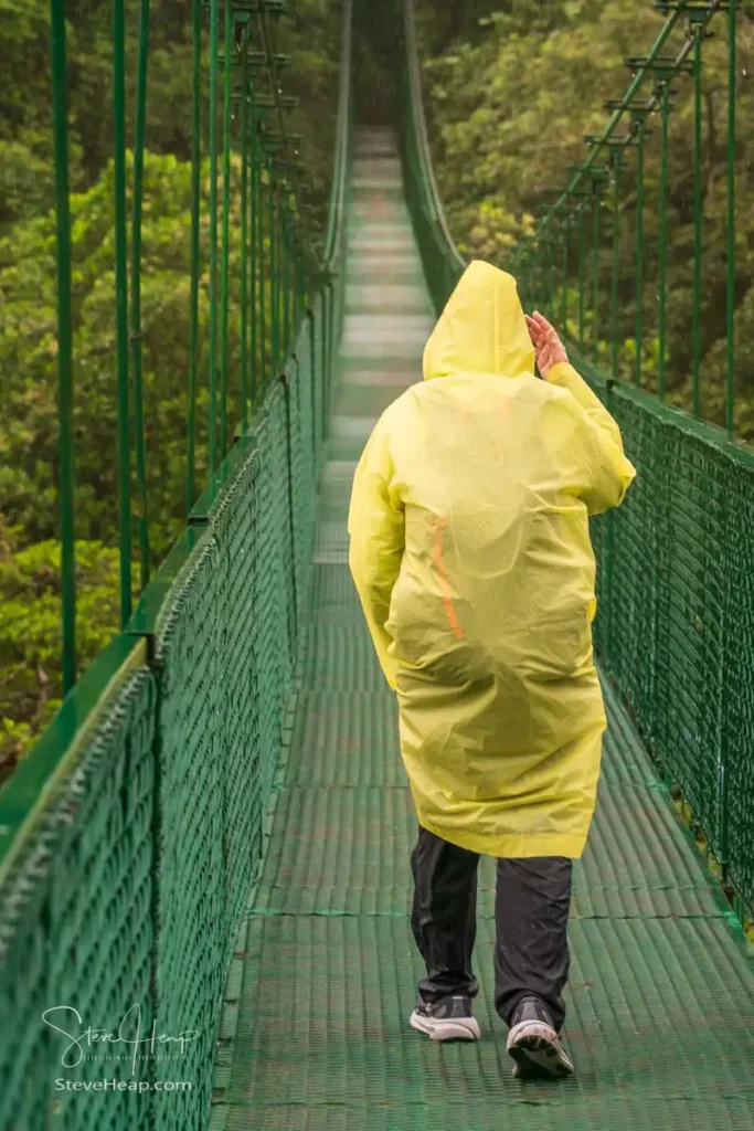 Crossing a hanging bridge in the Santa Elena cloud forest