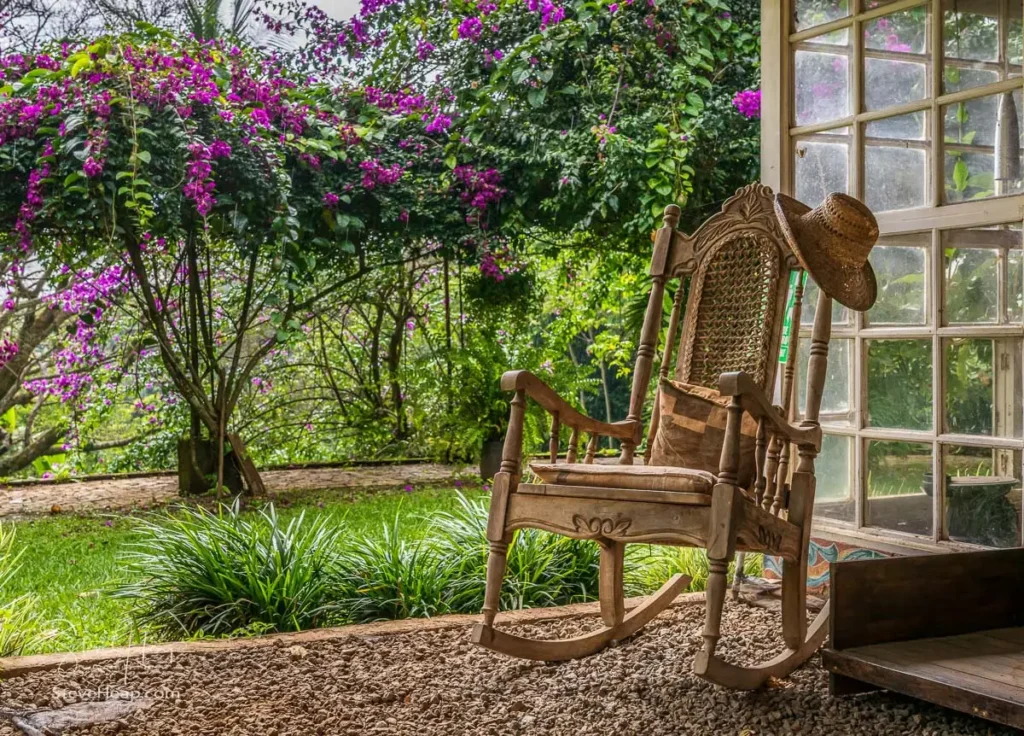 Old wooden rocking chair for relaxing after a hard day picking coffee beans