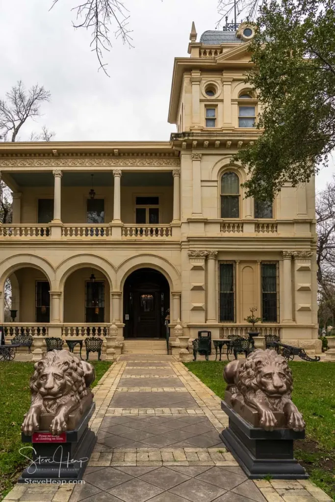 Exterior view of the historic Villa Finale museum showcasing refined Victorian architecture and brickwork in the King William district.