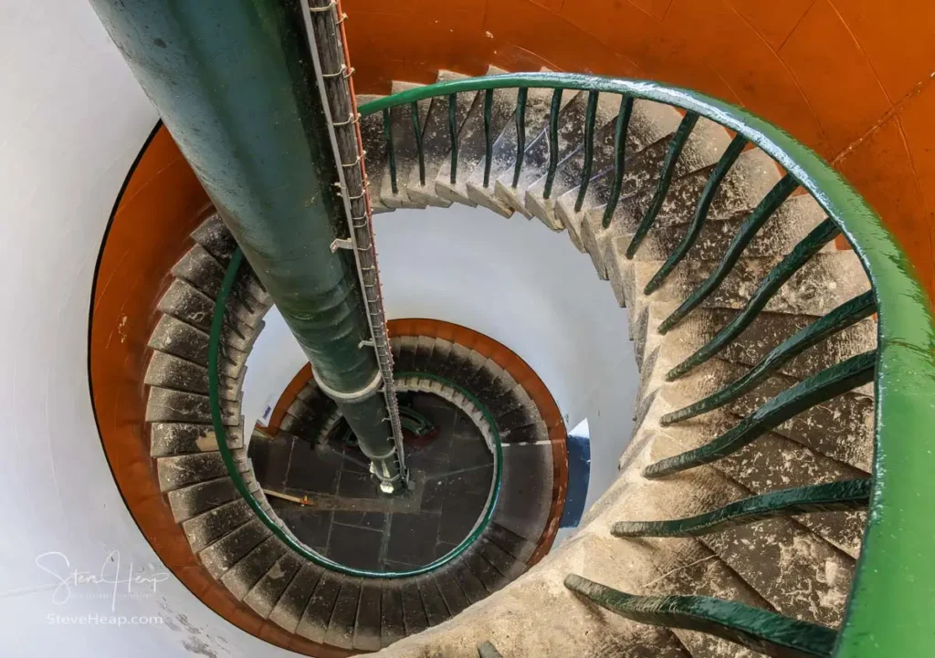 Looking down the white spiral staircase inside the tower at South Stack Lighthouse